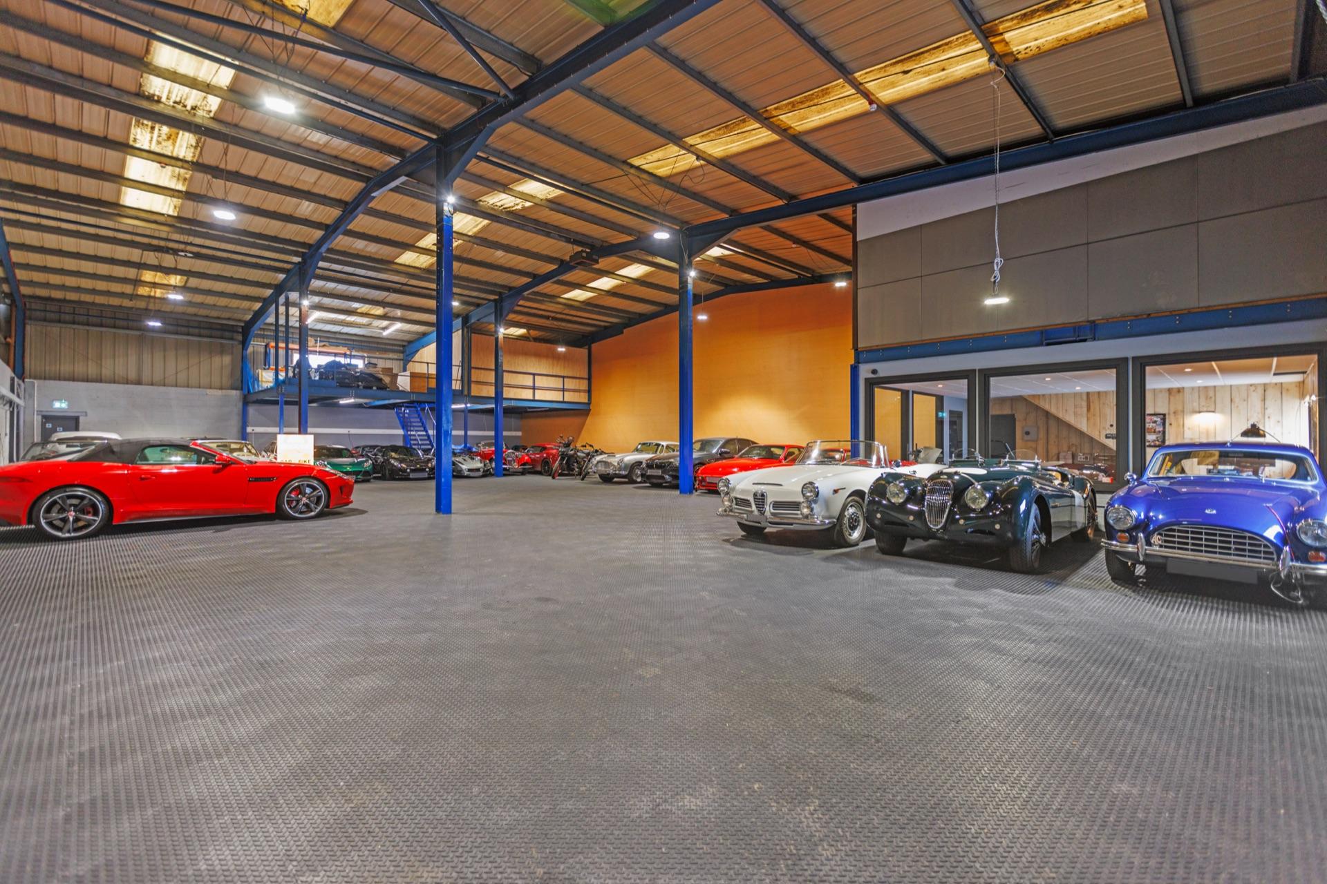 Secure Car Storage facility interior with luxury and classic vehicles in Guildford, Surrey